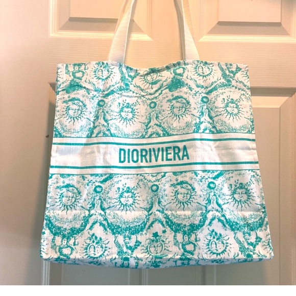 Dior Riviera Tote! Used one time! Teal &Cream
It’s like brand new Christian Dior - Picture 1 of 9